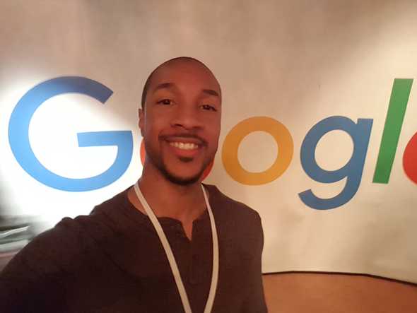 Selfie in front of Google backdrop
